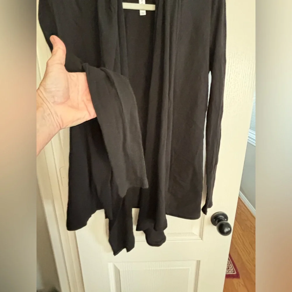 Fabletics wrap type cardigan. Size CS would for sure fit S and probably a medium